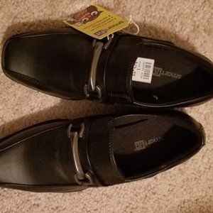 Brand new never been worn black dress shoes for boys.